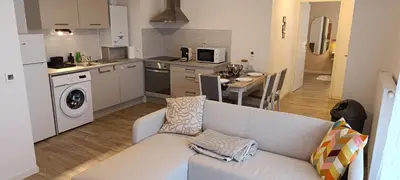Cuisine ou kitchenette dans l'établissement Le Portet avec parking privé