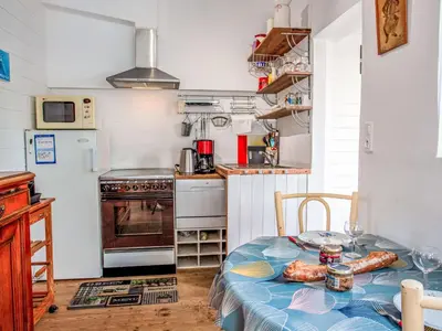 Cuisine ou kitchenette dans l'établissement Holiday Home Norecic-2 by Interhome
