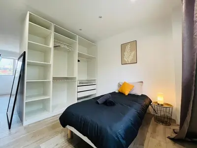 Un ou plusieurs lits dans un hébergement de l'établissement Casa Contemporaine