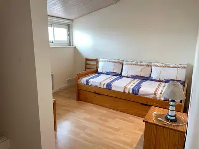Un ou plusieurs lits dans un hébergement de l'établissement Maison spacieuse à 100m de la plage, 6 pers. - FR-1-323-557