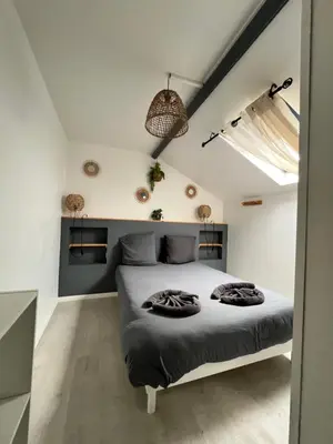 Un ou plusieurs lits dans un hébergement de l'établissement Joli Duplex - Centre ville - Amazonie
