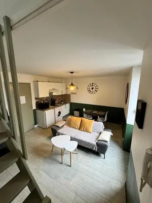 Coin salon dans l'établissement Joli Duplex - centre ville - Verde