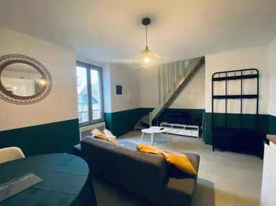 Coin salon dans l'établissement Joli Duplex - centre ville - Verde