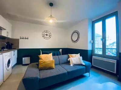 Coin salon dans l'établissement Joli Duplex - centre ville - Verde