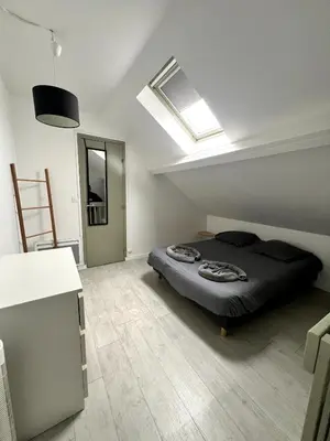 Un ou plusieurs lits dans un hébergement de l'établissement Joli Duplex - centre ville - Verde