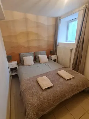 Un ou plusieurs lits dans un hébergement de l'établissement Appartement familial tout équipé - proche hôpital