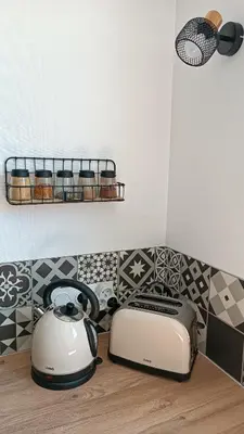 Coin salon dans l'établissement Charmant appartement proche Thales