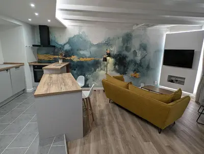 Cuisine ou kitchenette dans l'établissement Maison chaleureuse au cœur du centre ville