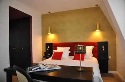 Un ou plusieurs lits dans un hébergement de l'établissement Les 3 Lieux - Hôtel, Restaurant, Espace sensoriel