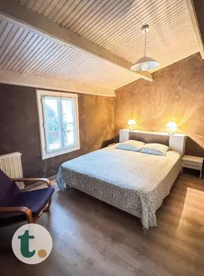 Un ou plusieurs lits dans un hébergement de l'établissement Tranquiloue - Grande maison spacieuse - PuyduFou