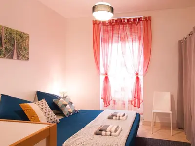 Un ou plusieurs lits dans un hébergement de l'établissement Appartement quartier NEY 3 personnes
