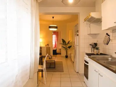 Cuisine ou kitchenette dans l'établissement Appartement quartier NEY 3 personnes