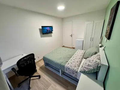 Télévision ou salle de divertissement dans l'établissement York's APPART