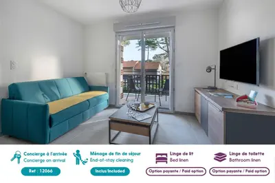 Télévision ou salle de divertissement dans l'établissement Appartement pour 4 à 150m de la Mer