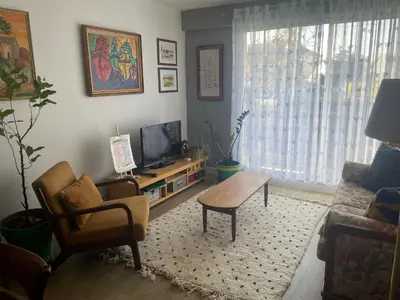 Télévision ou salle de divertissement dans l'établissement Chez Rita