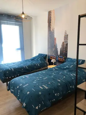 Un ou plusieurs lits dans un hébergement de l'établissement Casa Nomana 4 chambres