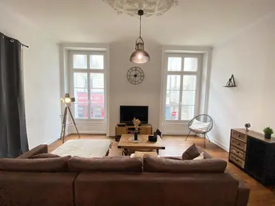 Coin salon dans l'établissement L'Appartement Privilège - 4 chambres - Coeur d'Angers, Spacieux et Élégant