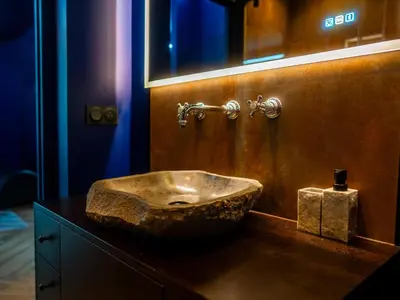Salle de bains dans l'établissement Le Voluptueux - Sauna - Jacuzzi - Centre-Ville