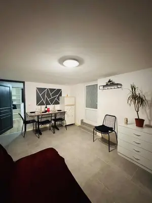 Coin salon dans l'établissement T3 Ancenis Saint Gereon