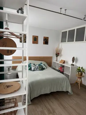 Un ou plusieurs lits dans un hébergement de l'établissement Séjournez dans un Charmant Appartement de 40 m