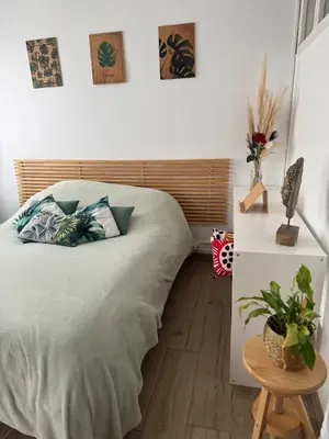 Un ou plusieurs lits dans un hébergement de l'établissement Séjournez dans un Charmant Appartement de 40 m