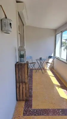 Coin salon dans l'établissement Maison de famille à 300m de la plage