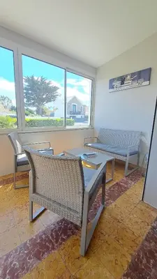 Coin salon dans l'établissement Maison de famille à 300m de la plage