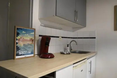 Cuisine ou kitchenette dans l'établissement Studio cosy cité des congrès wifi fibre