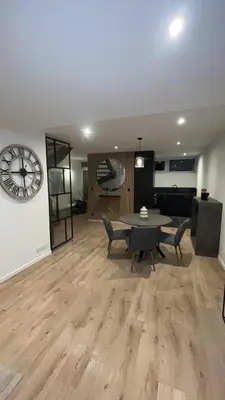Coin salon dans l'établissement Maison cozy proche centre ville