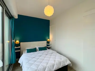 Un ou plusieurs lits dans un hébergement de l'établissement Appartement cosy à 50m de la plage à St Hilaire de Riez - FR-1-323-561