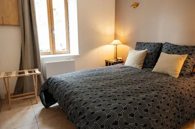 Un ou plusieurs lits dans un hébergement de l'établissement Le Logis du Vieux Donjon