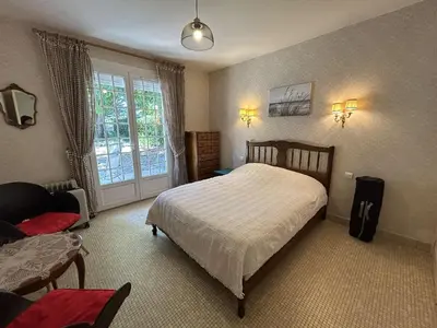 Un ou plusieurs lits dans un hébergement de l'établissement Maison cosy près plage avec jardin et parking - FR-1-224C-332