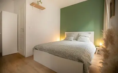 Un ou plusieurs lits dans un hébergement de l'établissement Le Bouffay - Quiet and soothing studio