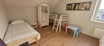Un ou plusieurs lits dans un hébergement de l'établissement Maison proche étang et circuit vélo