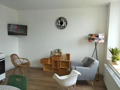 Télévision ou salle de divertissement dans l'établissement Chez Coralie et Jean