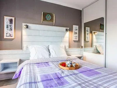 Un ou plusieurs lits dans un hébergement de l'établissement Apartment Les Tilleuls-2 by Interhome
