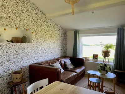 Coin salon dans l'établissement La Maisonette des Marais