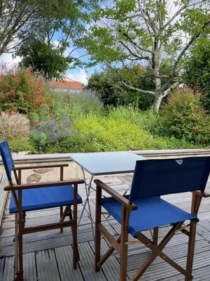 Jardin de l'établissement Jolie maison au calme entre Nantes et la mer