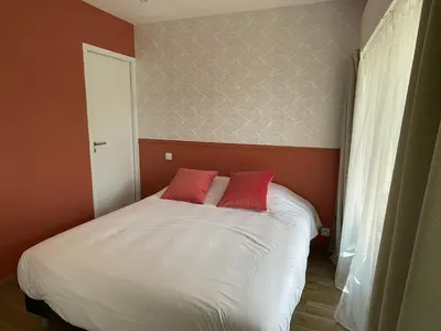 Un ou plusieurs lits dans un hébergement de l'établissement Jolie maison au calme entre Nantes et la mer