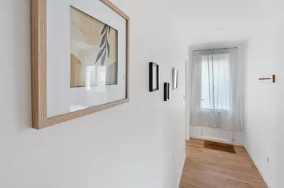 Un ou plusieurs lits dans un hébergement de l'établissement La Catinou - Maison confortable et spacieuse
