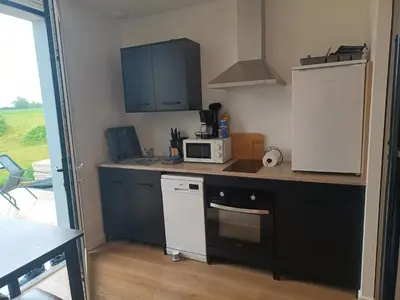 Cuisine ou kitchenette dans l'établissement Studio 2 à 4 personnes, 12 kilomètres du parc du Puy du F