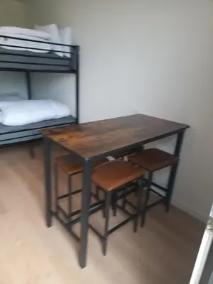 Un ou plusieurs lits dans un hébergement de l'établissement Studio 2 à 4 personnes, 12 kilomètres du parc du Puy du F