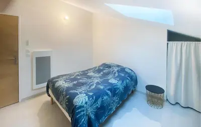Un ou plusieurs lits dans un hébergement de l'établissement Jolie Maison