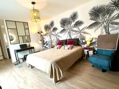 Un ou plusieurs lits dans un hébergement de l'établissement Villa récente spacieuse piscine St Gilles