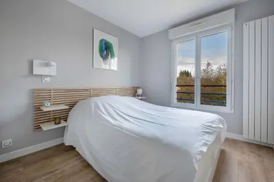 Un ou plusieurs lits dans un hébergement de l'établissement La Baule, appartement confortable pour 4