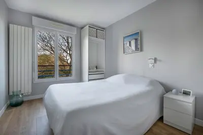 Un ou plusieurs lits dans un hébergement de l'établissement La Baule, appartement confortable pour 4
