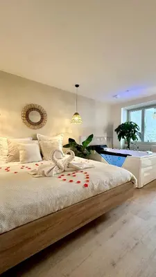 Un ou plusieurs lits dans un hébergement de l'établissement L Anaya Nantes Spa et Sauna