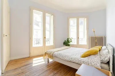 Un ou plusieurs lits dans un hébergement de l'établissement Appartement cosy hypercentre T3 Graslin