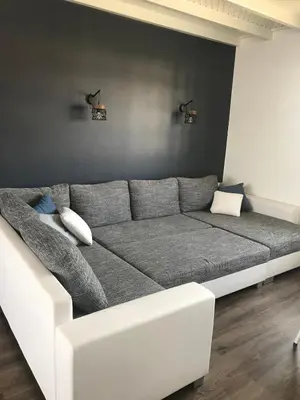 Coin salon dans l'établissement Maison de famille de 150 m2 à 15 minutes de la mer