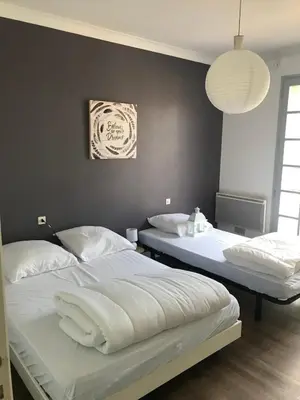 Un ou plusieurs lits dans un hébergement de l'établissement Maison de famille de 150 m2 à 15 minutes de la mer